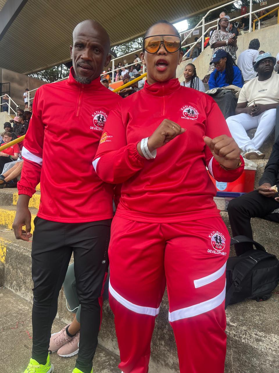 Mphathi with a community member at a sporting event